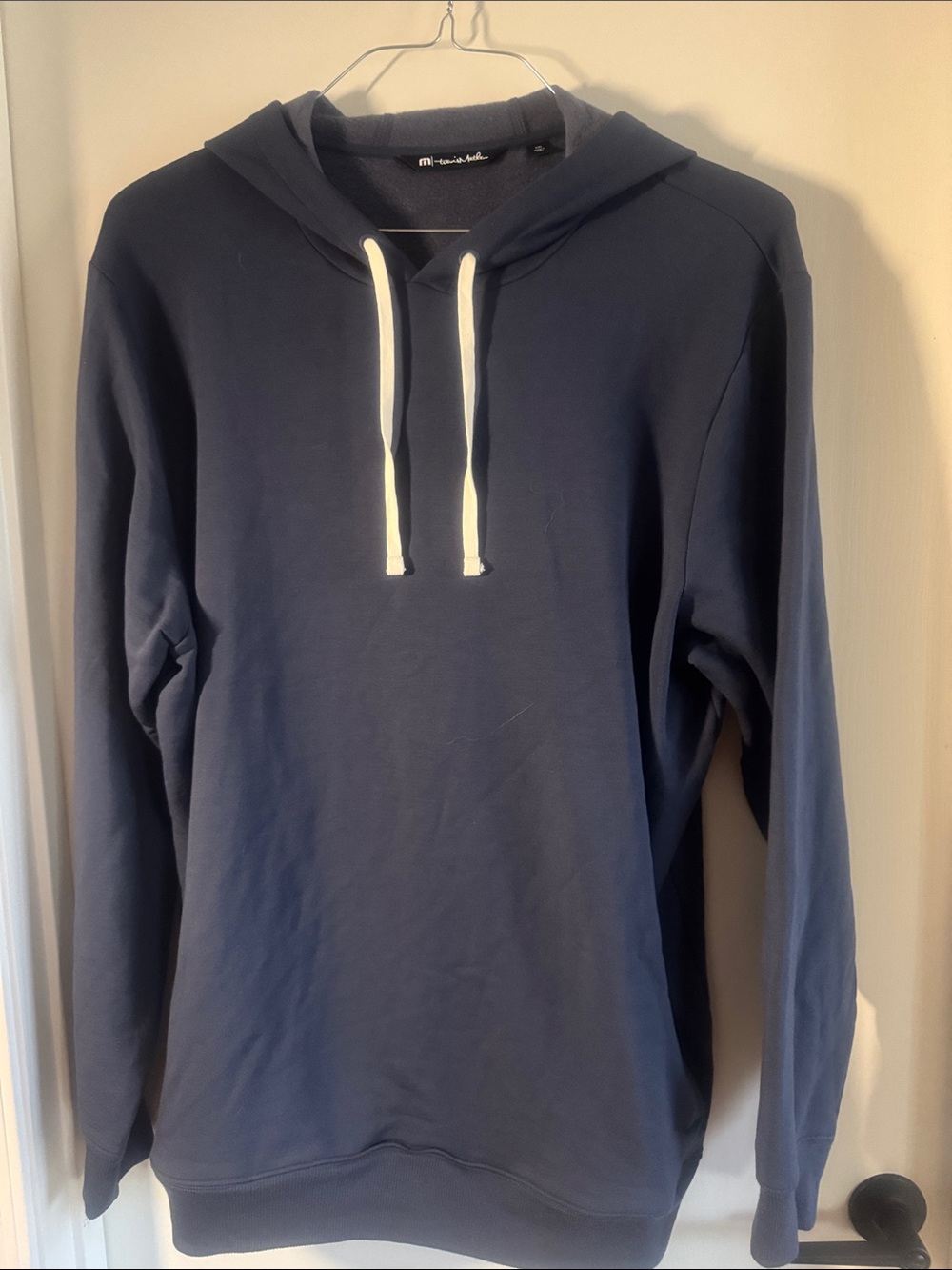 Travis Mathew Navy Pullover Hoodie with White Drawstrings